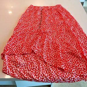 Red white viscose skirt. Elastic waist. Falls nicely